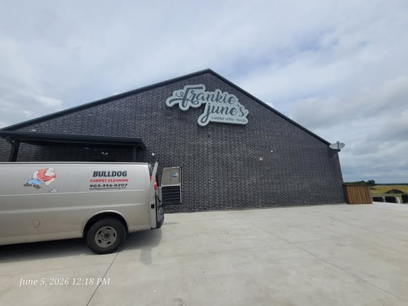 Bulldog Carpet Cleaning service van on-site at commercial job in Quinlan, TX